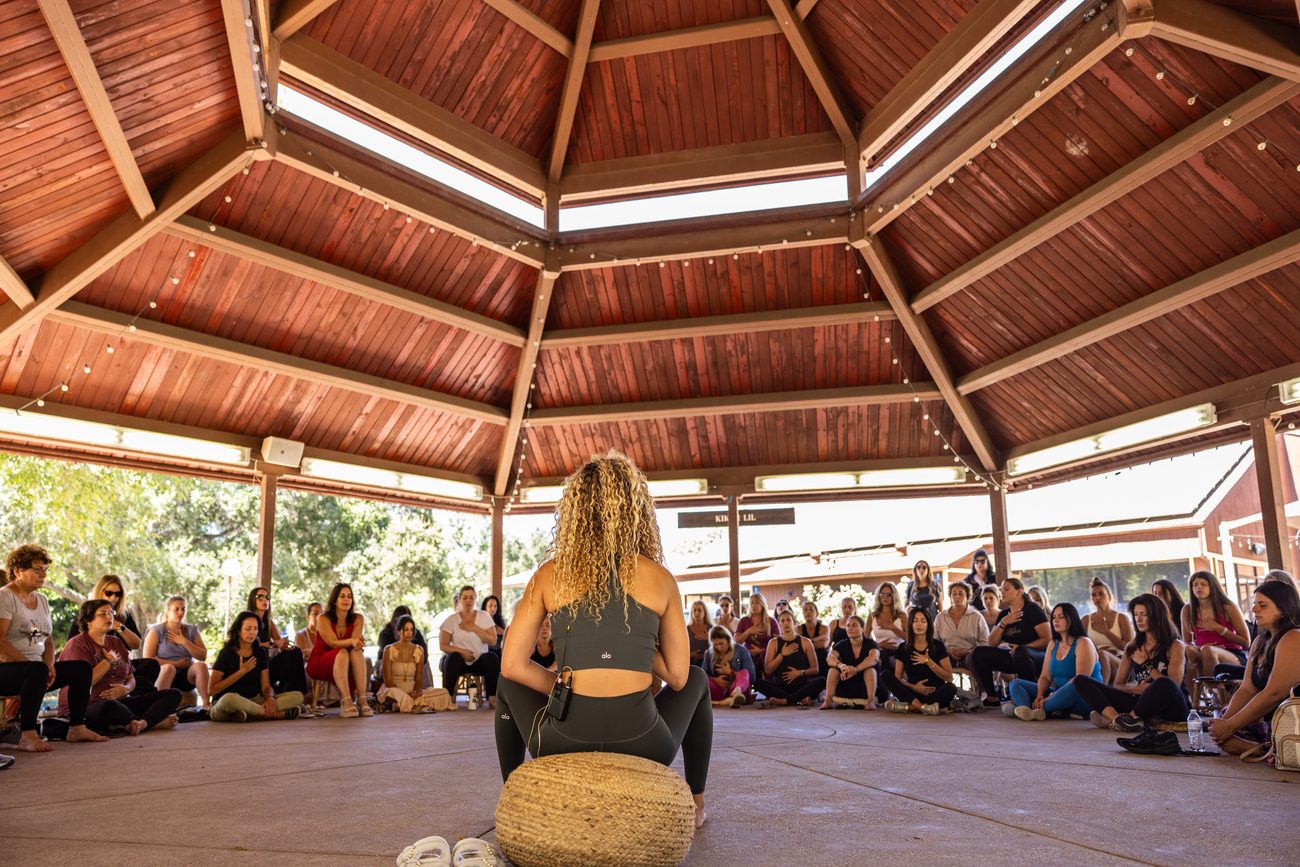 A breathwork and sound circle in a garden pavilion