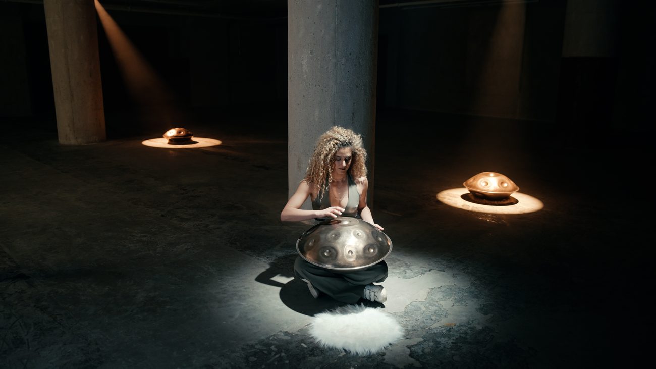 Roni playing her handpan